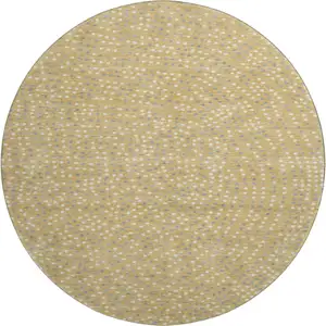 Photo of 8' Gold Ivory And Gray Polka Dot Washable Round Rug With UV Protection