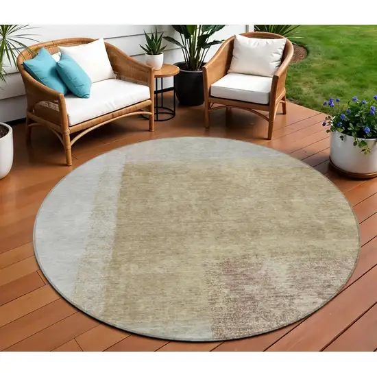 8' Gold Ivory And Gray Round Abstract Washable Indoor Outdoor Area Rug Photo 1