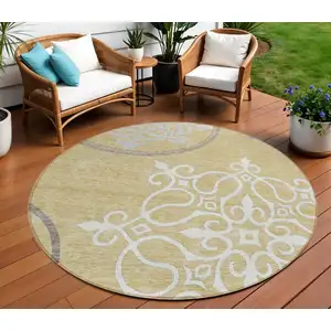 Photo of 8' Gold Ivory And Gray Round Floral Medallion Washable Indoor Outdoor Area Rug