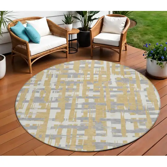8' Gold Ivory And Gray Round Striped Washable Indoor Outdoor Area Rug Photo 2