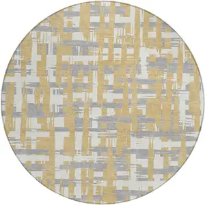 Photo of 8' Gold Ivory And Gray Round Striped Washable Indoor Outdoor Area Rug