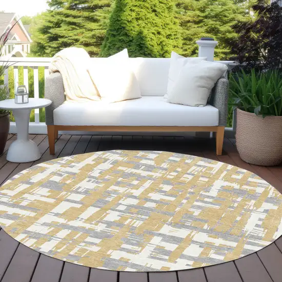 8' Gold Ivory And Gray Round Striped Washable Indoor Outdoor Area Rug Photo 5