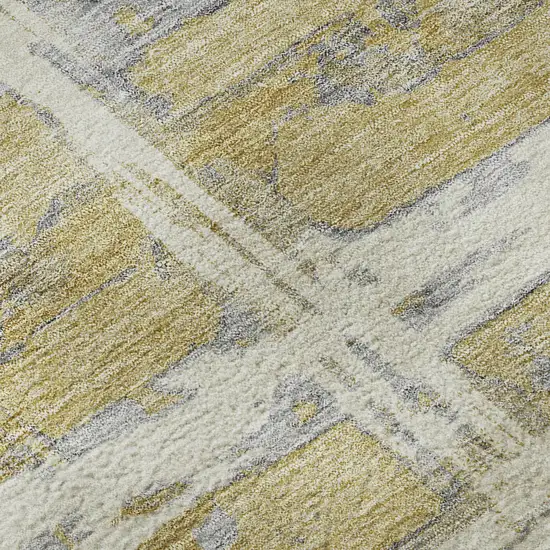 8' Gold Ivory And Gray Striped Washable Round Rug With UV Protection Photo 9