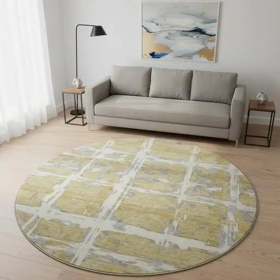8' Gold Ivory And Gray Striped Washable Round Rug With UV Protection Photo 2