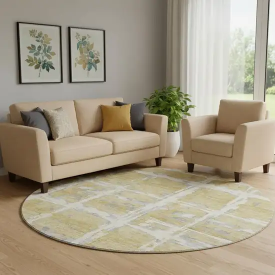 8' Gold Ivory And Gray Striped Washable Round Rug With UV Protection Photo 1