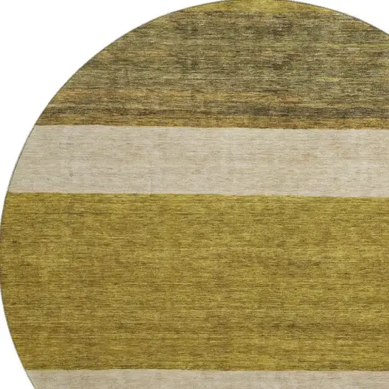 8' Gold Ivory And Gray Striped Washable Round Rug With UV Protection Photo 2