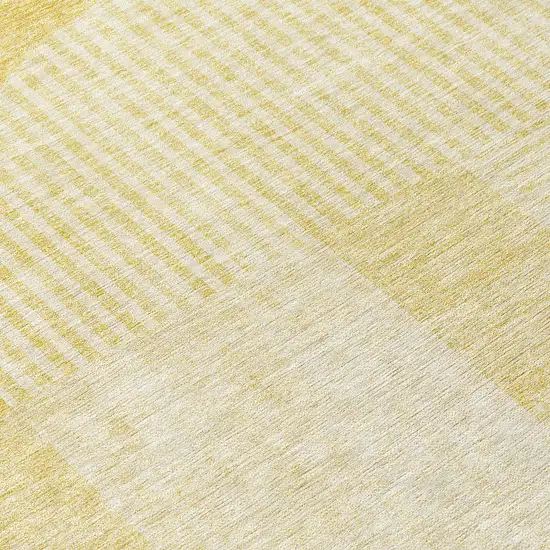 8' Gold Ivory And Yellow Round Geometric Washable Indoor Outdoor Area Rug Photo 9