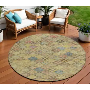 Photo of 8' Gold Pink And Blue Round Geometric Washable Indoor Outdoor Area Rug