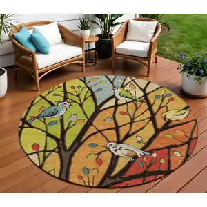 Photo of 8' Gold Red And Green Round Botanical Leaves Washable Indoor Outdoor Area Rug