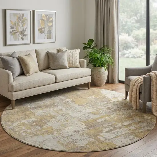 8' Gold Taupe And Beige Abstract Washable Round Rug With UV Protection Photo 1