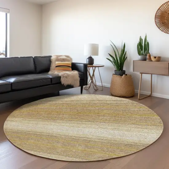 8' Gold Taupe And Ivory Striped Washable Round Rug With UV Protection Photo 4