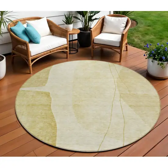 8' Gold Wheat And Beige Round Abstract Washable Indoor Outdoor Area Rug Photo 1