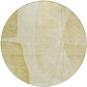 Photo of 8' Gold Wheat And Beige Round Abstract Washable Indoor Outdoor Area Rug