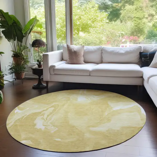 8' Gold Wheat And Ivory Round Abstract Washable Indoor Outdoor Area Rug Photo 7