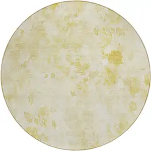 Photo of 8' Gold Wheat And Ivory Round Floral Washable Indoor Outdoor Area Rug