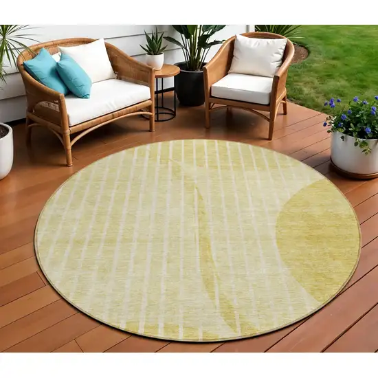 8' Gold Wheat And Ivory Round Striped Washable Indoor Outdoor Area Rug Photo 1