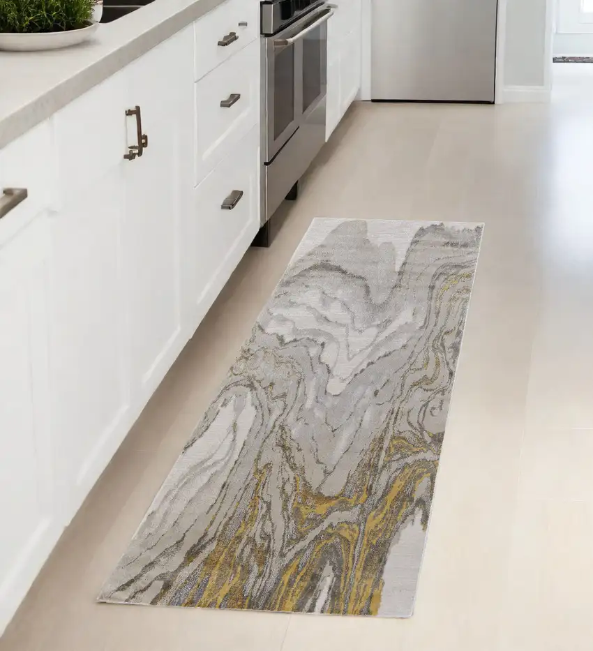8' Gold and Ivory Abstract Runner Rug Photo 1