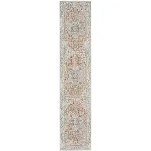 Photo of 10' Gold and Ivory Oriental Power Loom Washable Runner Rug