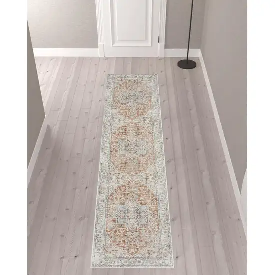 10' Gold and Ivory Oriental Power Loom Washable Runner Rug Photo 2