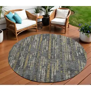 Photo of 8' Granite Gray Ivory And Gold Round Abstract Washable Indoor Outdoor Area Rug