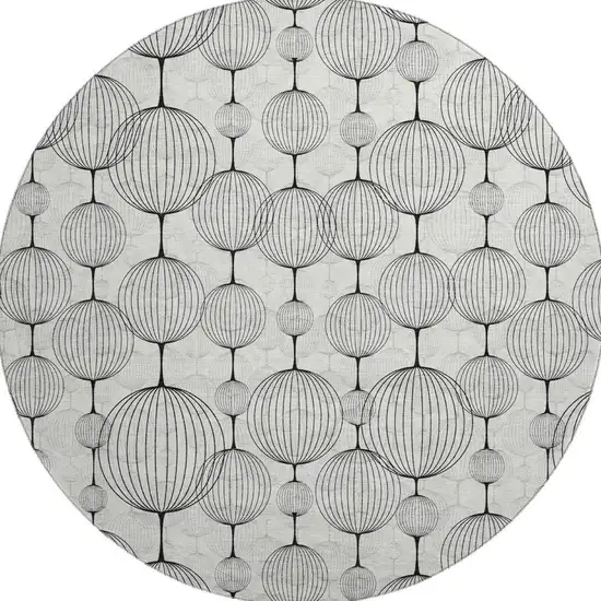 8' Graphite And Silver Geometric Washable Round Rug With UV Protection Photo 4