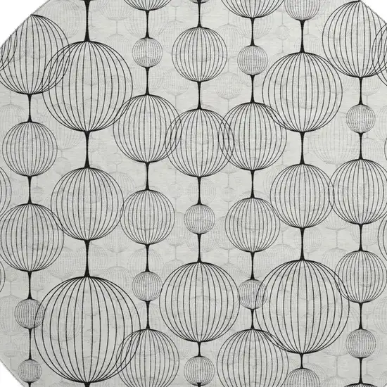 8' Graphite And Silver Geometric Washable Round Rug With UV Protection Photo 3