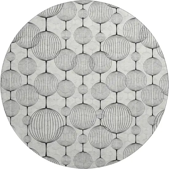 8' Graphite And Silver Geometric Washable Round Rug With UV Protection Photo 1