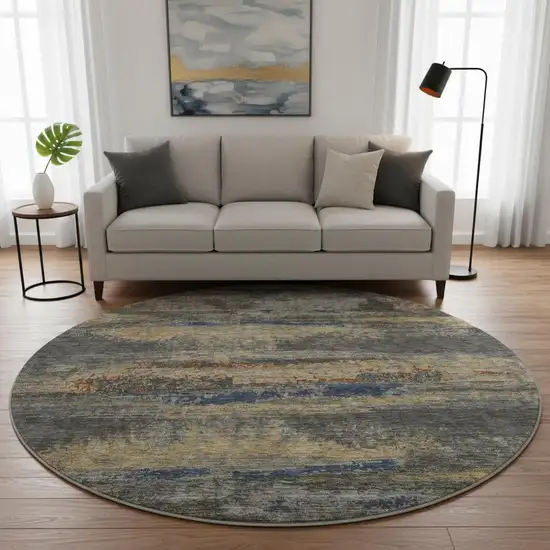 8' Graphite Gold And Blue Abstract Washable Round Rug With UV Protection Photo 2