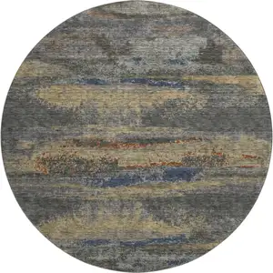 Photo of 8' Graphite Gold And Blue Abstract Washable Round Rug With UV Protection