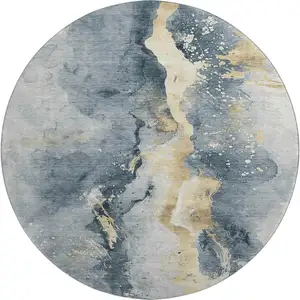 Photo of 8' Graphite Gold And Silver Abstract Washable Round Rug With UV Protection