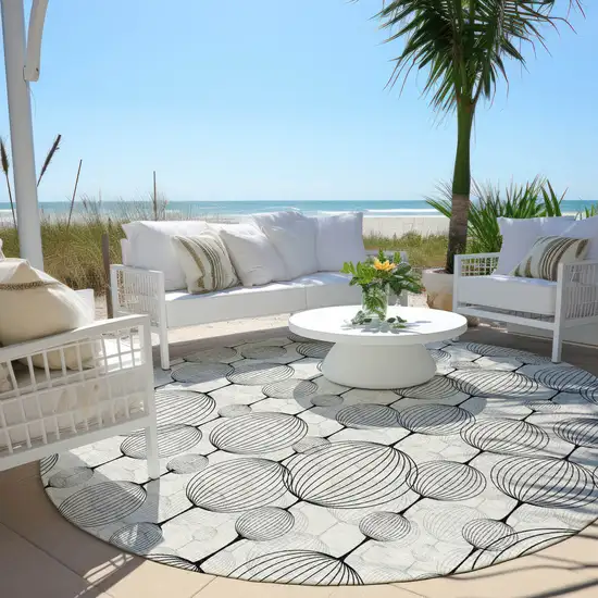 8' Graphite Gray And Silver Round Geometric Washable Indoor Outdoor Area Rug Photo 6
