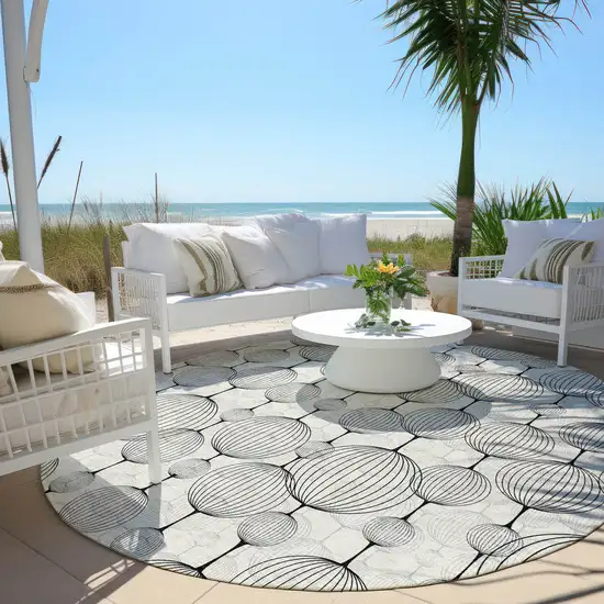 8' Graphite Gray And Silver Round Geometric Washable Indoor Outdoor Area Rug Photo 6