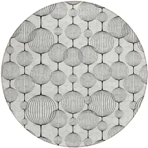 Photo of 8' Graphite Gray And Silver Round Geometric Washable Indoor Outdoor Area Rug