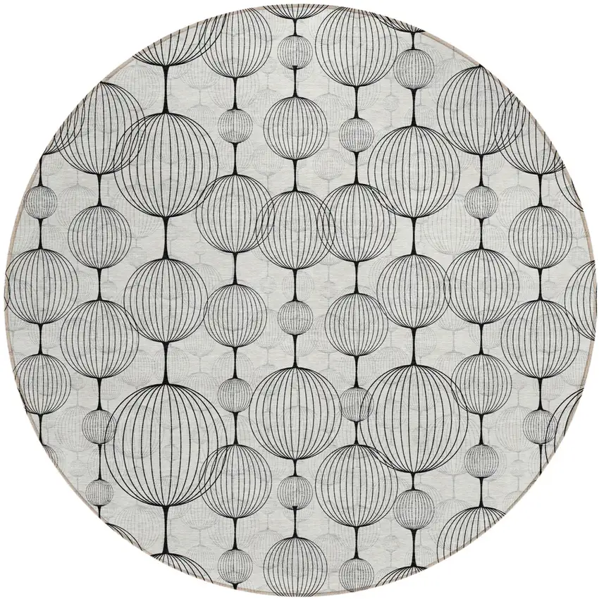 8' Graphite Gray And Silver Round Geometric Washable Indoor Outdoor Area Rug Photo 1