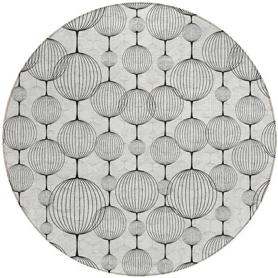 8' Graphite Gray And Silver Round Geometric Washable Indoor Outdoor Area Rug Photo 5