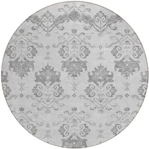 Photo of 8' Graphite Gray And Silver Round Oriental Washable Indoor Outdoor Area Rug
