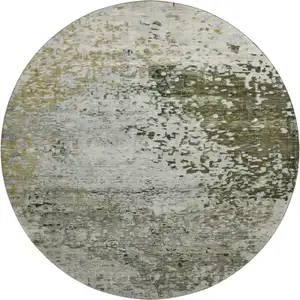 Photo of 8' Graphite Green And Ivory Abstract Washable Round Rug With UV Protection