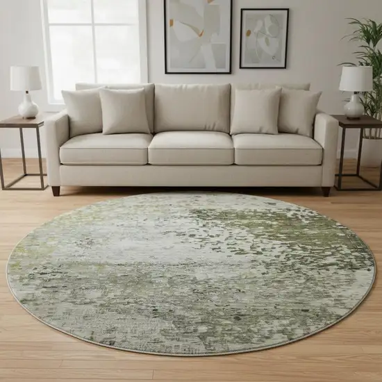 8' Graphite Green And Ivory Abstract Washable Round Rug With UV Protection Photo 2