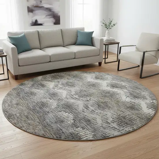 8' Graphite Ivory And Beige Abstract Washable Round Rug With UV Protection Photo 1