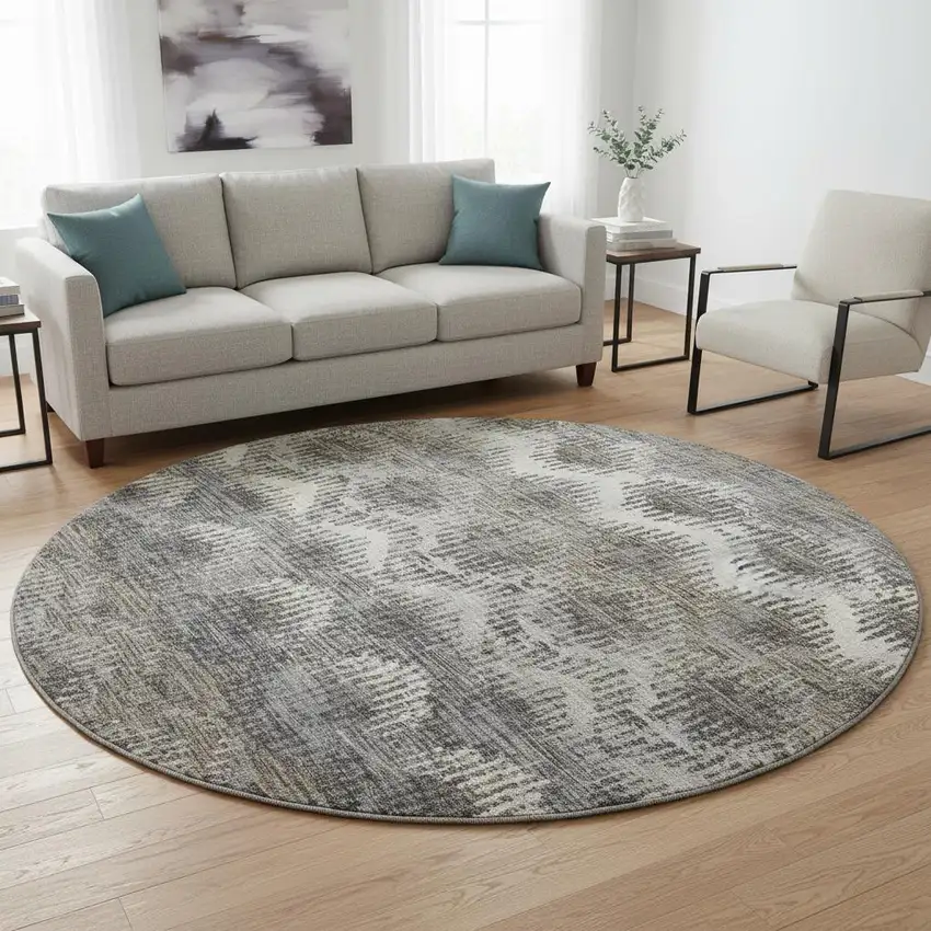 8' Graphite Ivory And Beige Abstract Washable Round Rug With UV Protection Photo 1