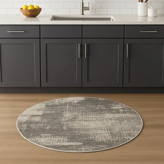 4' Gray Abstract Power Loom Round Rug Photo 1