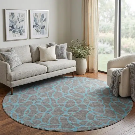 8' Gray And Aqua Geometric Washable Round Rug With UV Protection Photo 1