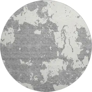 Photo of 8' Gray And Beige Abstract Washable Round Rug With UV Protection