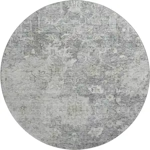Photo of 8' Gray And Beige Floral Washable Round Rug With UV Protection