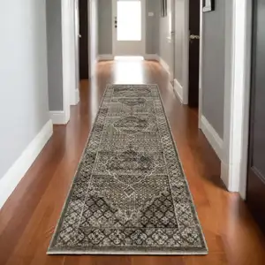Photo of 8' Gray And Beige Medallion Runner Rug With Fringe