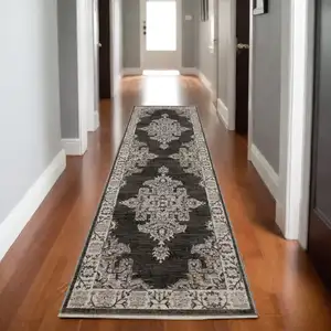 Photo of 8' Gray And Beige Medallion Runner Rug With Fringe