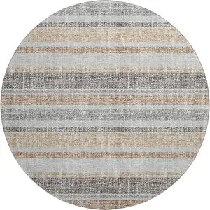 Photo of 8' Gray And Beige Striped Washable Round Rug With UV Protection
