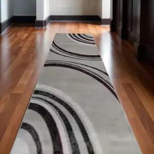 Photo of 14' Gray And Black Abstract Runner Rug