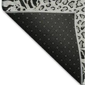 Photo of 8' Gray And Black Animal Print Washable Area Rug With UV Protection