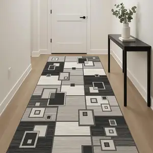 Photo of 12' Gray And Black Geometric Runner Rug